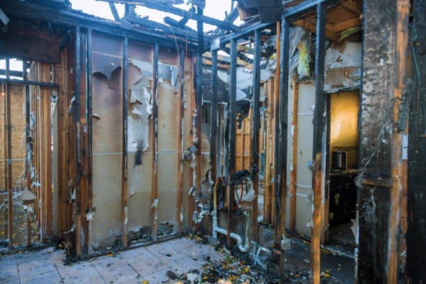 Professional Fire Damage Restoration technician working in Cushing, WI